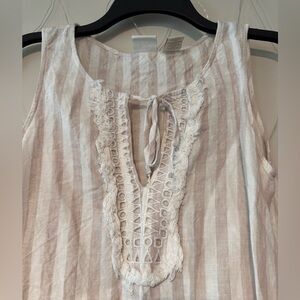 A lovely pink/ white striped sundress, perfect for the beach or a casual day out